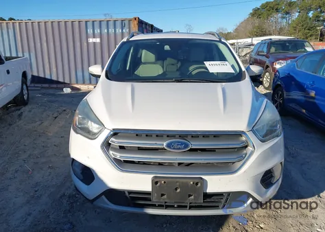 2017 Ford Escape Titanium z USA, uszkodzony, nr VIN 1FMCU0J94HUD64422